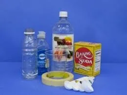 Common household items - baking soda box, bleach bottle, vinegar jug arranged near pool edge